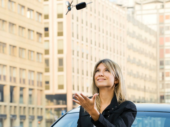 Business woman with car keys