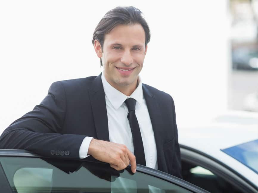 Businessman with a car bought on lease purchase
