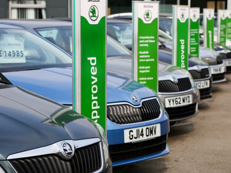 Used car forecourt with a row of approved used Skodas