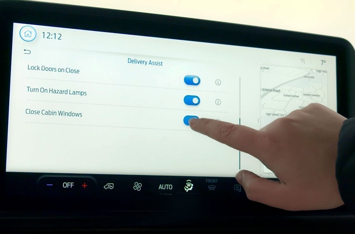 Finger touching vehicle touchscreen displaying delivery assist settings with toggles for lock doors, hazard lamps and…