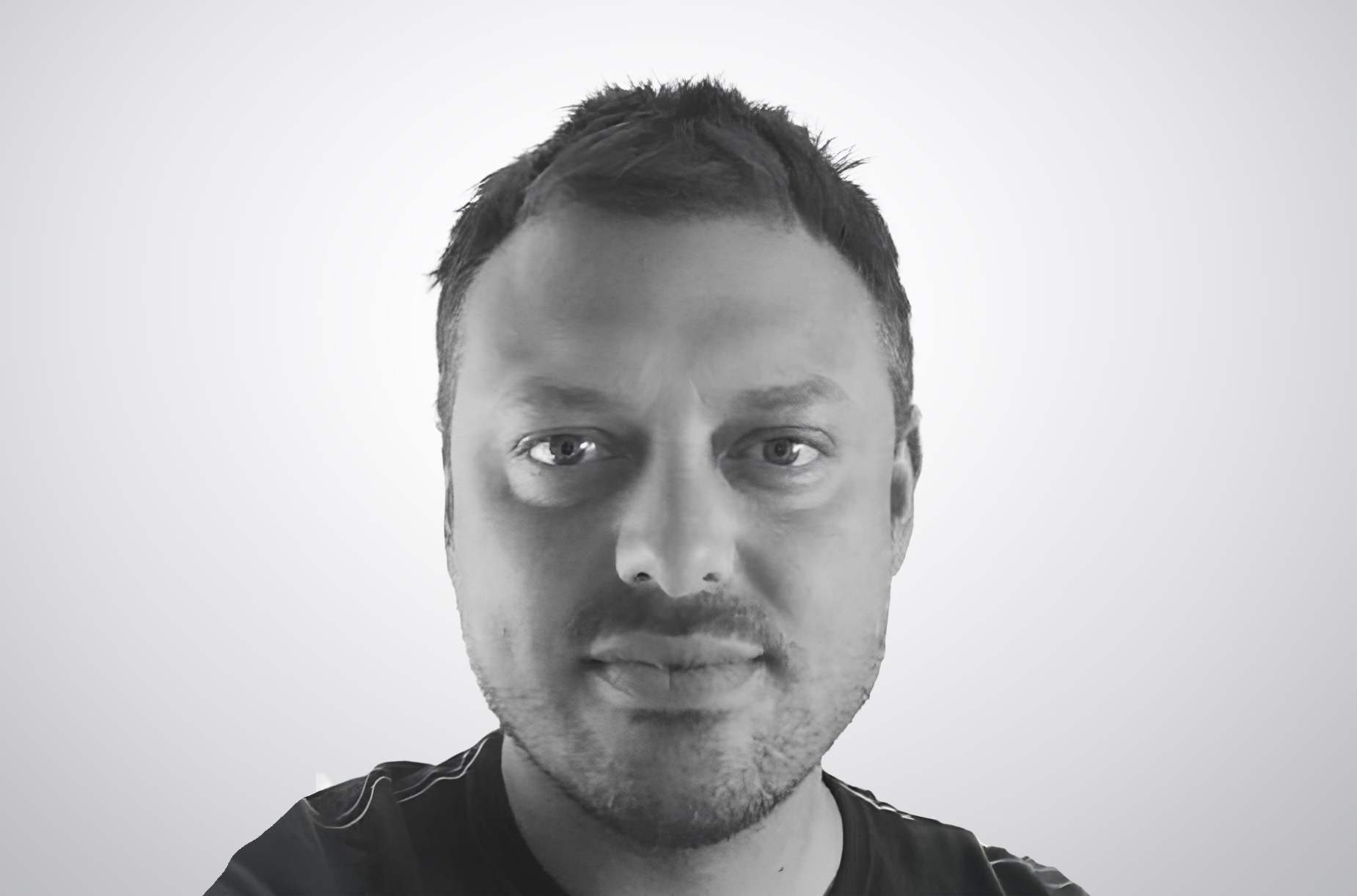 Stuart Wakeling, head of sales for Business Vans, black and white headshot portrait.