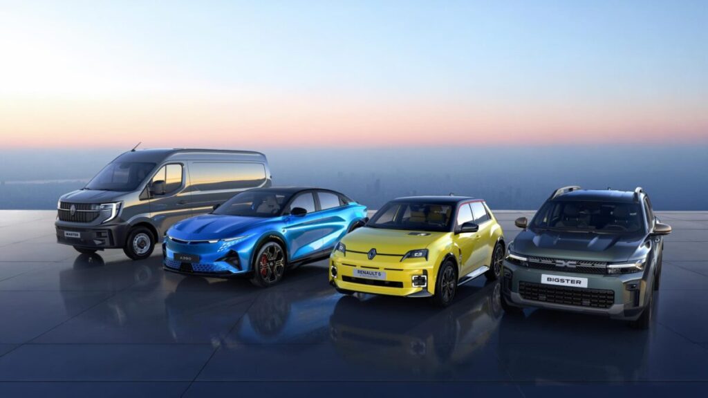 Four Renault vehicles parked on rooftop at dawn: silver van, blue sports car, yellow hatchback, and grey SUV.