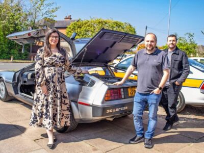 Cars On Screen secures funding to buy Back To The Future DeLorean From left Brogan Alexander of Beta Commercial Finance Will Morris of Cars On Screen and Dave Malpass of BCRS Business Loans