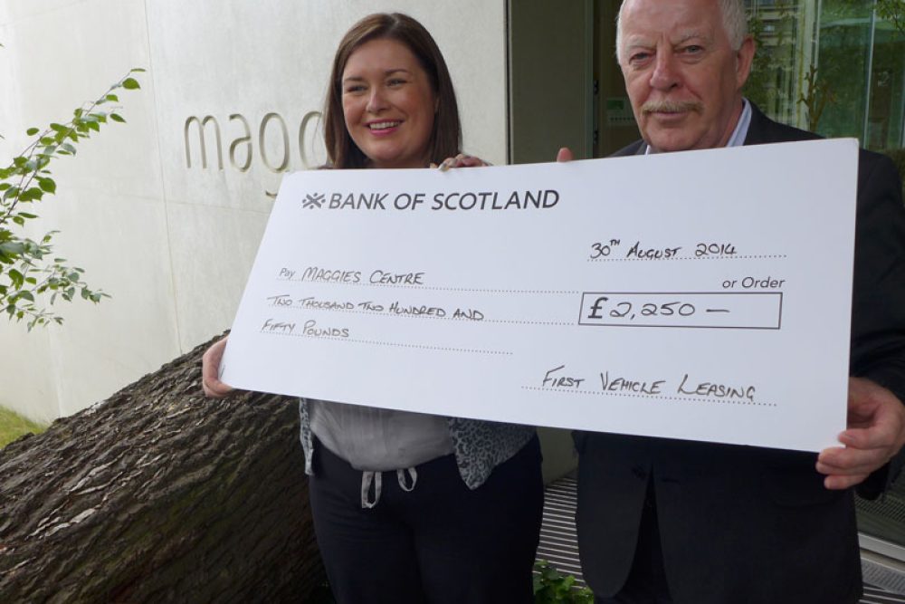 104_Dixie Deans of First Vehicle Leasing former Celtic FC footballer presents a £2250 cheque to Tricia Imrie Centre Fundraising Manager Maggie’s Glasgow