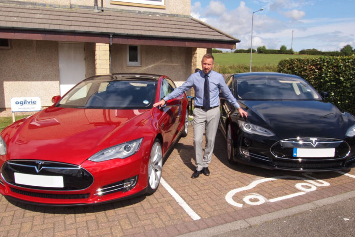 108_Ogilvie Fleet operations director Jim Hannah with the electric Tesla Model 5 cars 1