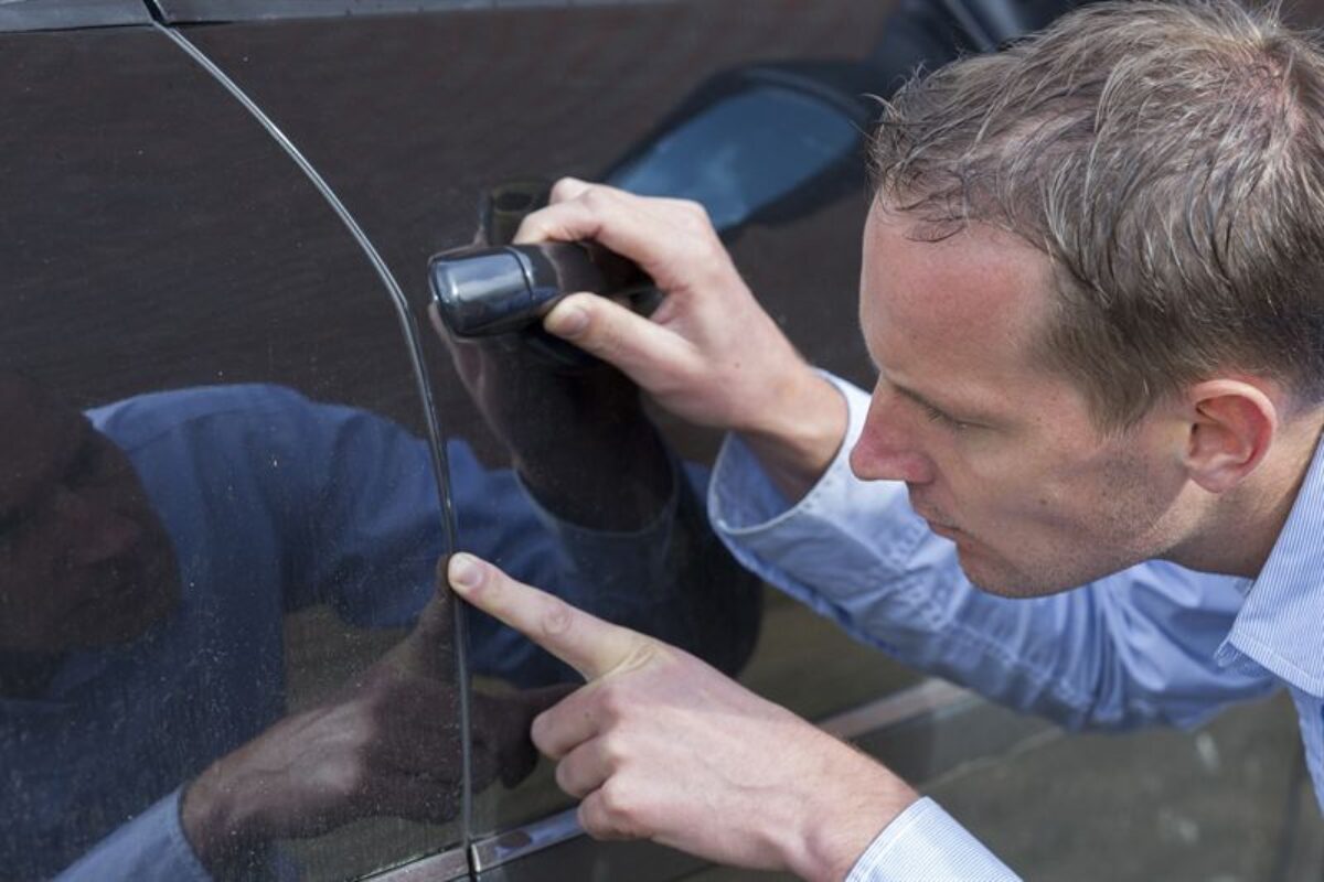 1228_Car_Park_Scratch_examined_by_company_car_driver
