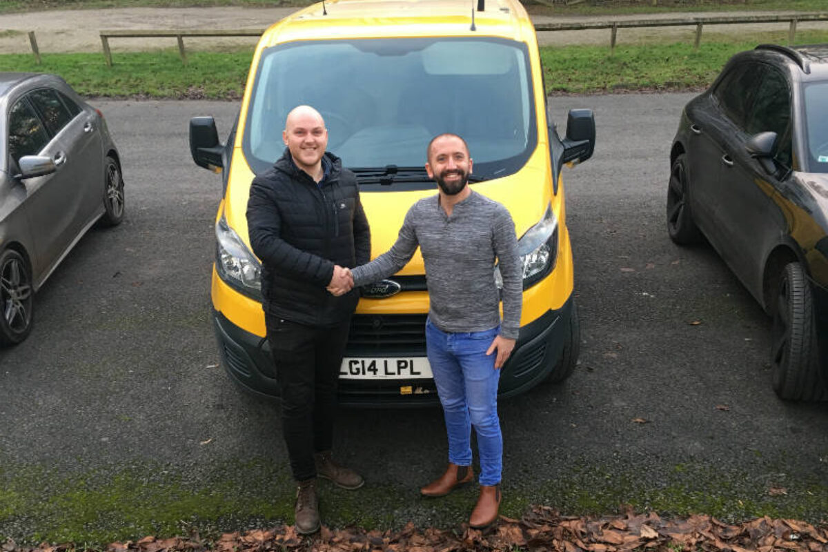 Chris Forrest (left) and Liam Mulligan shake on the van finance deal for TCB Designs which will help the Lancashire based firm grow its business