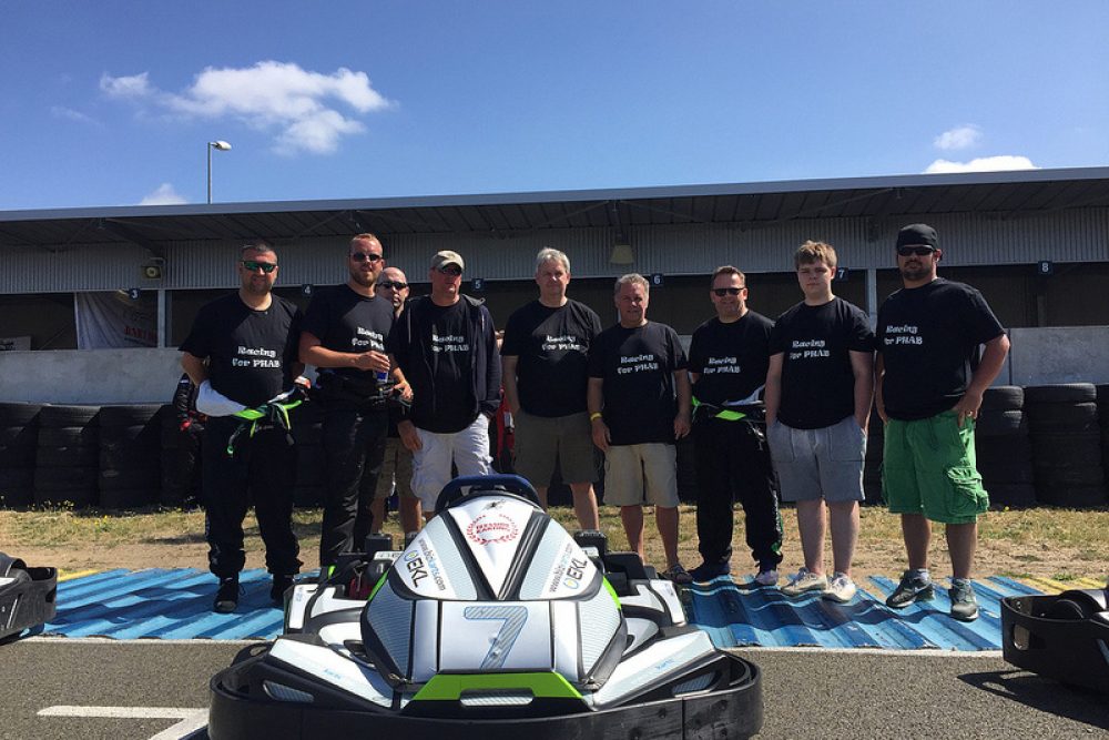 Mike Smith sixth from left with the Fleet Assist karting team and support staff