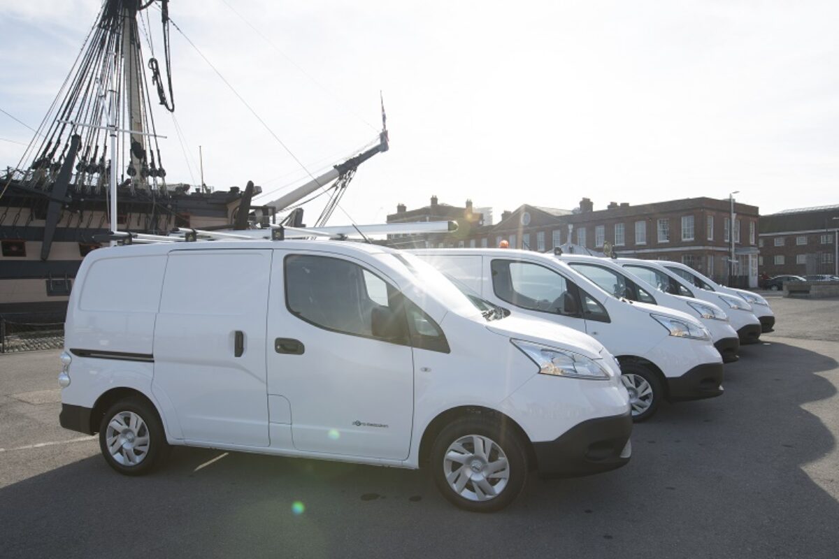 First of 48 electric Nissan e-NV200 vans arrive at Portsmouth Naval Base with HMS Victory as the backdrop