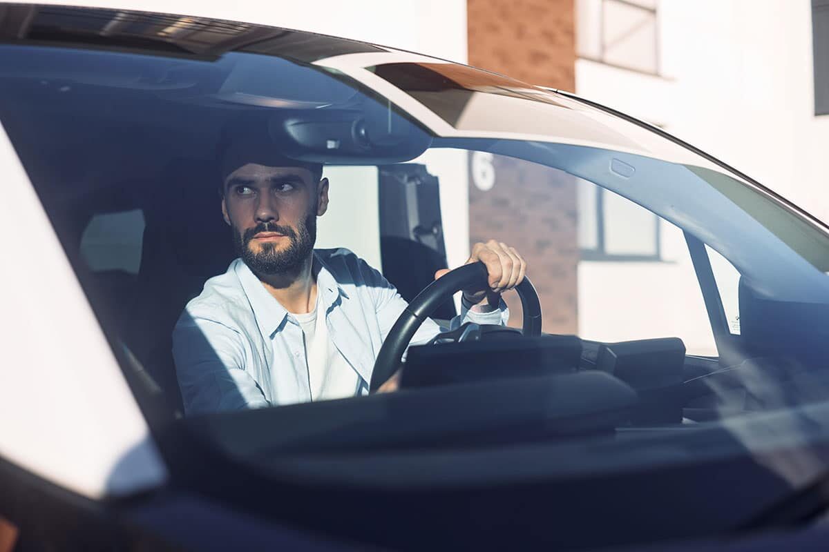 sitting in the vehicle young stylish man is with 2023 11 27 05 29 47 utc
