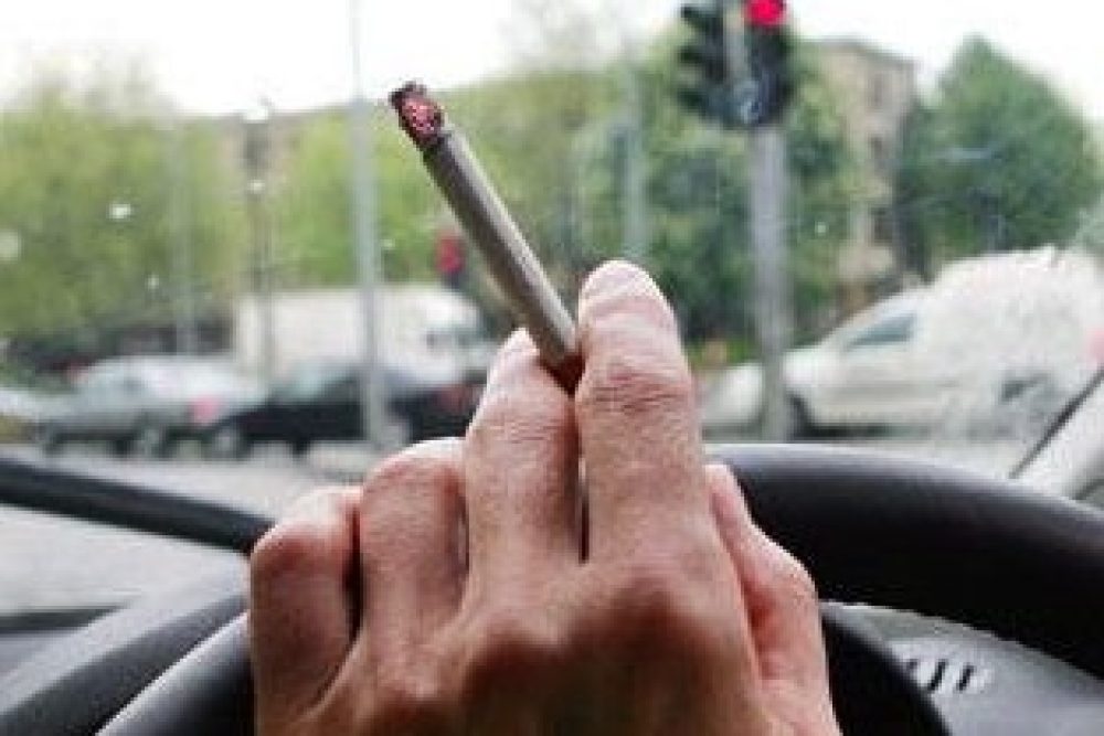 smoker at wheel